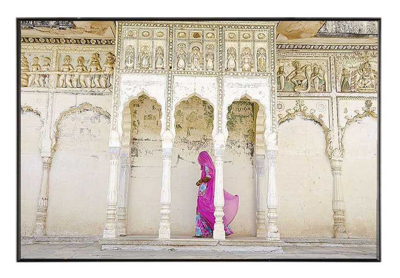 Woman walking through temple india alison wirght